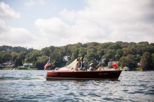 wedding couple riding a boat